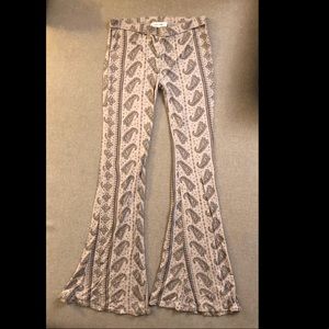 FLARED PANTS WITH BLACK PATTERN
